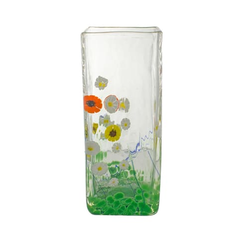 Rectangular tall clear vase with white, yellow, and orange daisies with green stems